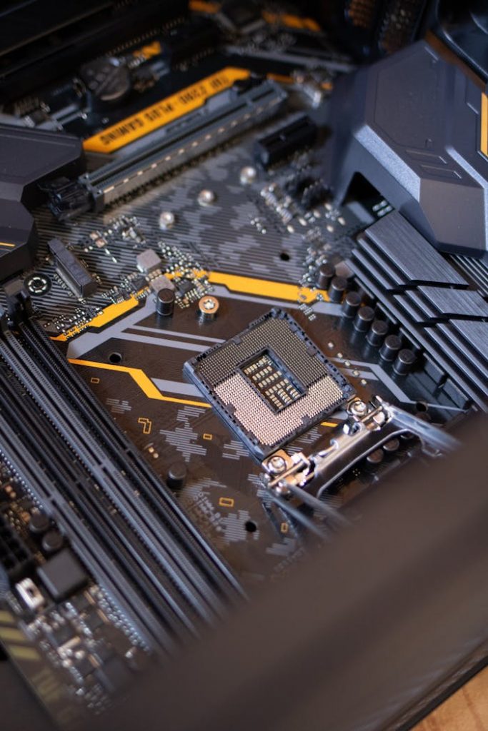 pexels-photo-2582937 Detailed view of a computer motherboard highlighting electronic components and technology connections.